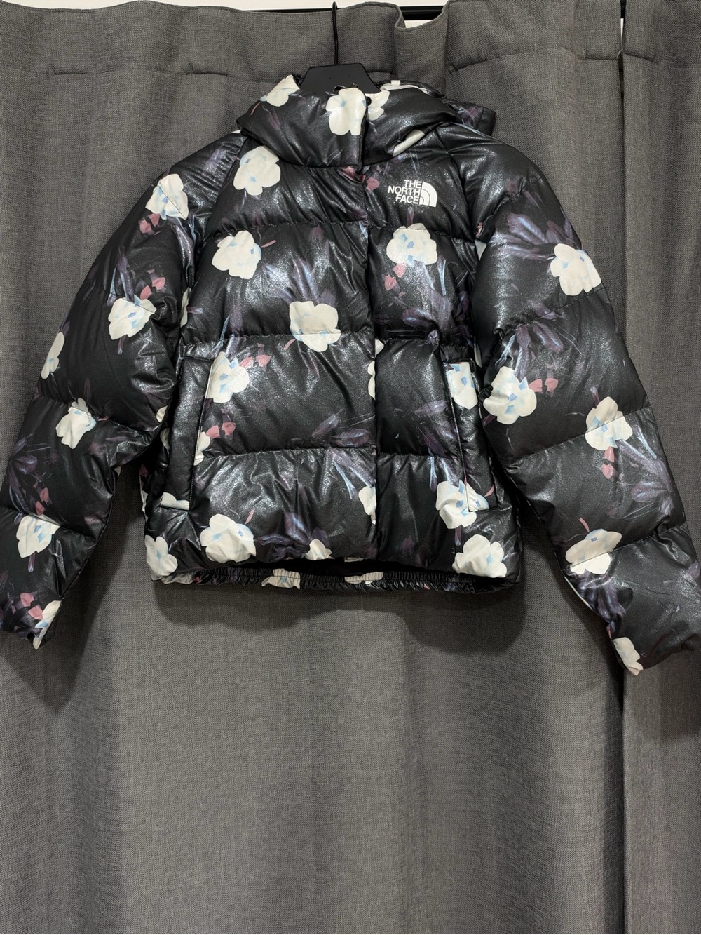 The North Face Black Floral Short Puffer Jacket with White Flowers